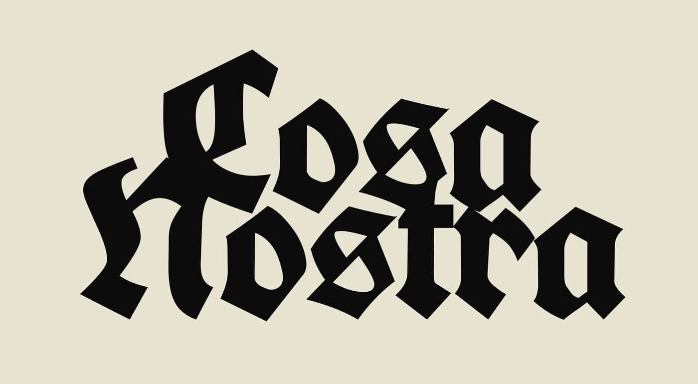 Interlock wordmark in black on cream